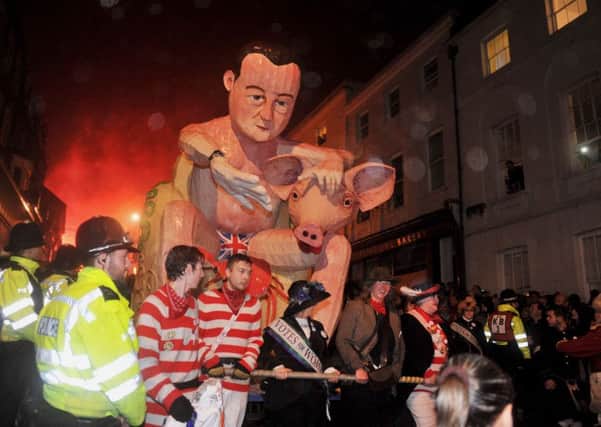 The Waterloo Bonfire Society tableau of David Cameron with a pig at Lewes Bonfire 2015 celebrations this evening
Photograph taken by Simon Dack SUS-150611-055908001