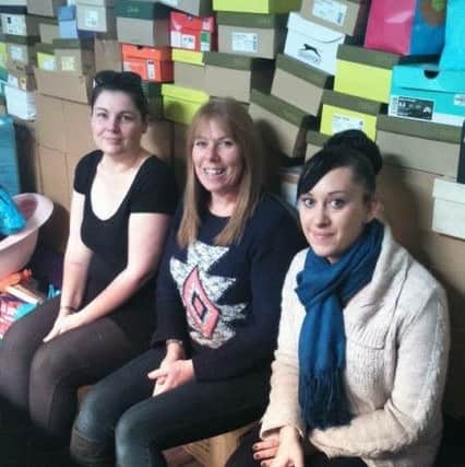 Sarah King, Anne Henley and Vicky Johnson working on last year's Project Shoebox