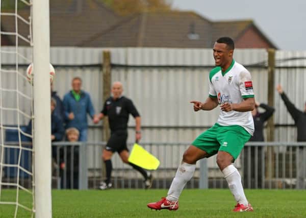 Chike Kandi celebrates his second in the rout of Canvey Island / Picture by Tim Hale