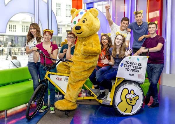 Picture shows: One Show presenters Matt Baker & Alex Jones join the young people chosen for The Rickshaw Challenge 2015.  All six of the young riders have been supported by projects that have received BBC Children in Need funding, and are undertaking the challenge to raise money for the Charity. SUS-150411-101008001