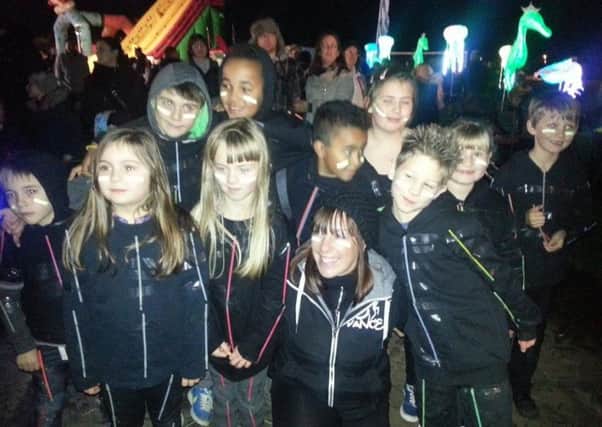 Sarah King with children from SK Dance at Adur Sea of Lights