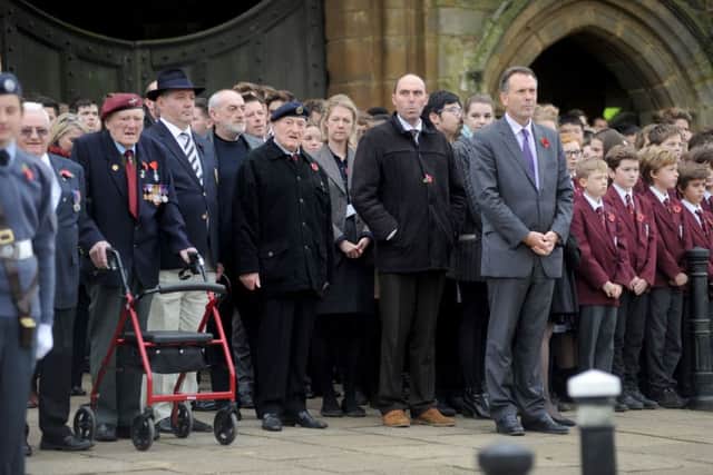 Remembrance service in front of Battle Abbey, 11/11/15. SUS-151111-124935001