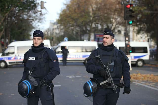 Police activity by the Bataclan concert hall, Paris, one of the venues for the attacks in the French capital which are feared to have killed around 120 people. PPP-151114-123230001