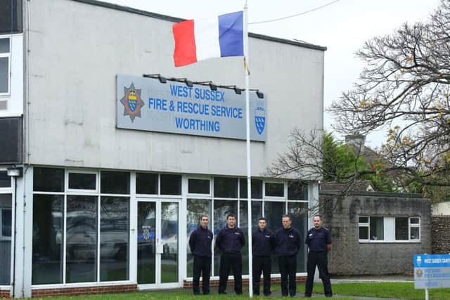 WORTHING FIRE STATION SHOWING RESPECT  FOR PARIS THIS MORNING SUS-151115-121327001