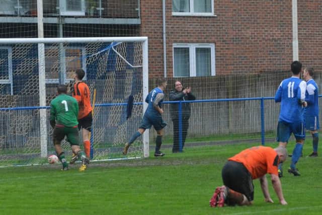 Phil Johnson scores the fifth. Picture by Grahame Lehkyj