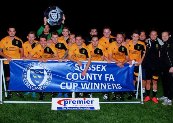 Golds celebrate their Sussex Community Shield success PICTURE BY TERRY BUCKMAN