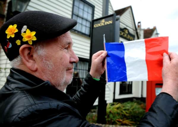 French flags have been placed along Worthing Road, Southwater by Les Les White. Here atthe Cock Inn. Pic Steve Robards SR1525912 SUS-151116-164309001