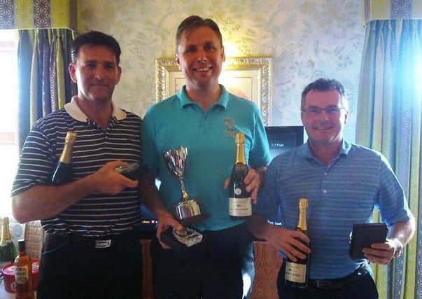 The winning team - Andeas Pretorius, Matthew Wykes, and Mike Coomber