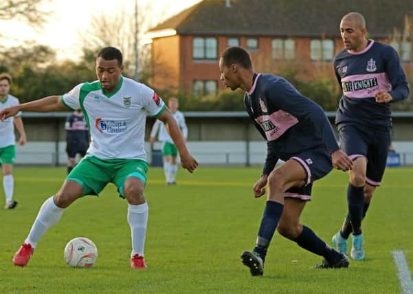 Chike Kandi was on target at Merstham but later went off injured / Picture by Tim Hale