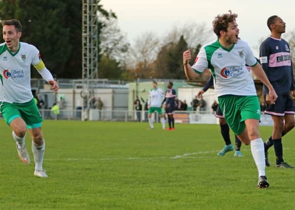 Harvey Whyte celebrates scoring the opener against Dulwich / Picture by Tim Hale