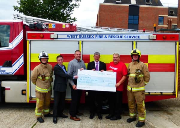 Viridoe donate to the Firefighters Charity SUS-151214-161159001