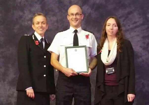 Deputy chief constable Olivia Pinkney, police community support officer Daryl Holter and East Sussex County Council's historic environment records officer Sophie Unger