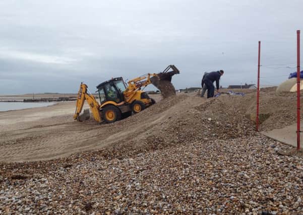 Work to move some of the shingle beach recently to protect Pagham Yacht Club and homes