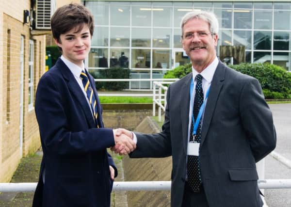 Jayden Bell, 13, with Mr Sean O'Neill, principal at Ormiston Six Villages Academy in Westergate