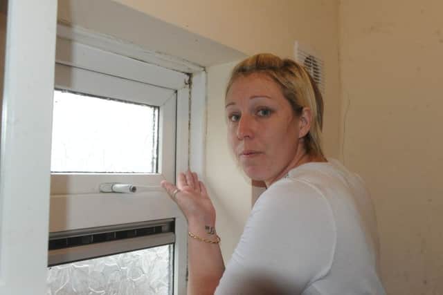 Theresa Gould with the mould around the bathroom window