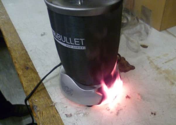 A counterfeit Nutribullet on fire