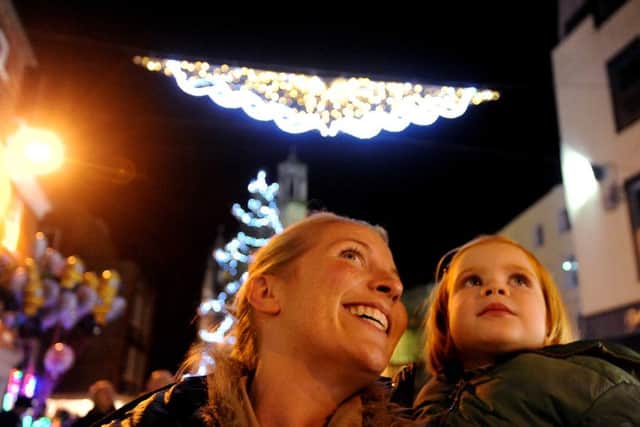 Chloe Scholes and her daughter Florecne, two, enjoying the lights ks1500596-11