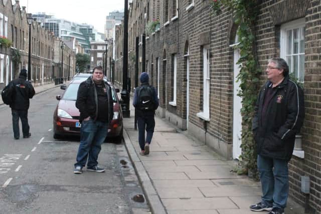 Barmy Army stride up expensive Roupell Street