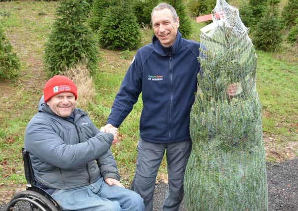 Clive Collins and captain Kevin Goddard at Catsfield Christmas Tree Farm