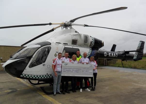 From left, Stephen Yeo, Steve Dunlop, Jill Yeo, Sean Yeo and Jo Yeo from the Riding for Ray team with air ambulance paramedic Gary Wareham