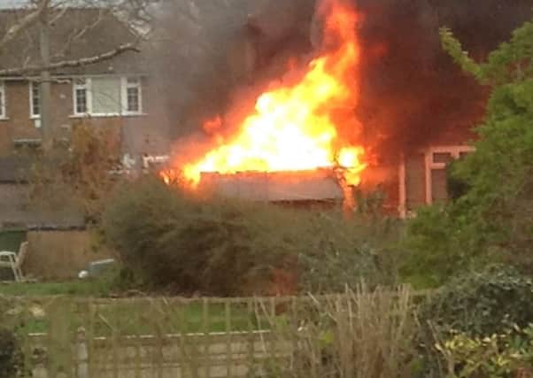Shed on fire in Franklands Village, Haywards Heath