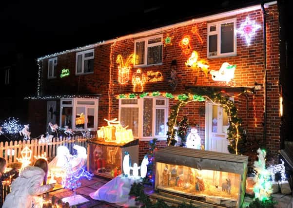 The Christmas lights are now on at No.6 Exton Road again. Pic Steve Robards SR1527344 SUS-150712-124052001