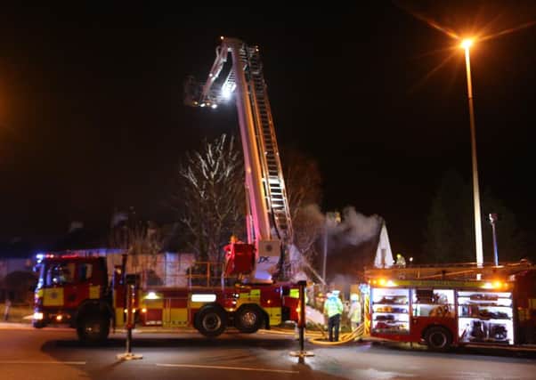 Firefighters tackling a blaze at a derelict building in Lancing.