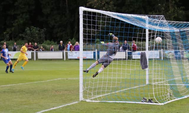 Sam Cole, far left of picture, scores for Hastings United in September's FA Cup tie away to Herne Bay. Picture courtesy Scott White