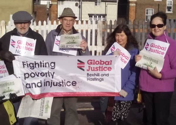 Members of Hastings and Bexhill Global Justice Now campaigning for climate change reform