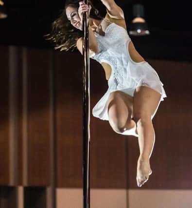 Catherine Meadley from eastbourne wins pole dancing competition SUS-150412-100643001