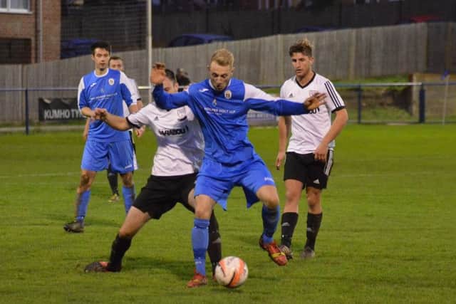 Max Miller shields the ball.. Picture by Grahame Lehkyj