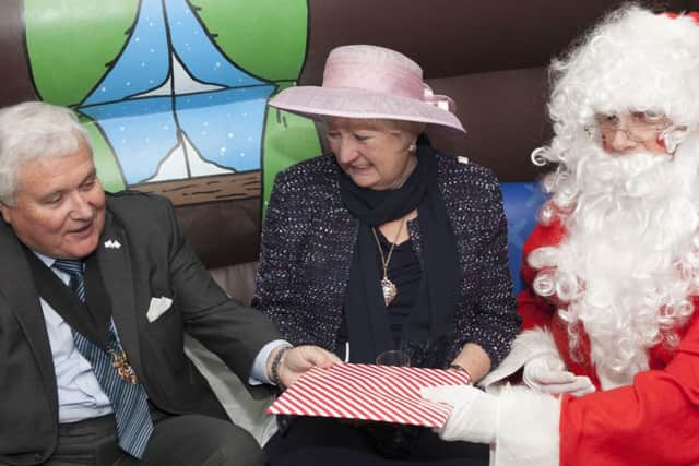 A present from Santa for Worthing mayor and mayoress Michael Donin and Linda Williams