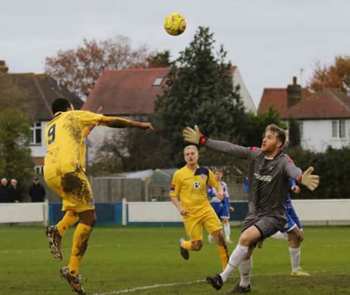 Hastings United striker Jack Harris (number 9) goes for goal during Saturday's league game against Herne Bay. Picture courtesy Scott White