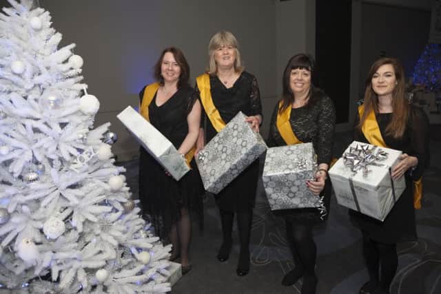 The ILG Christmas Gift Tree had more than 600 mystery gifts wrapped and delivered by the Crawley-based logistics company PICTURE: GRAHAM FRANKS