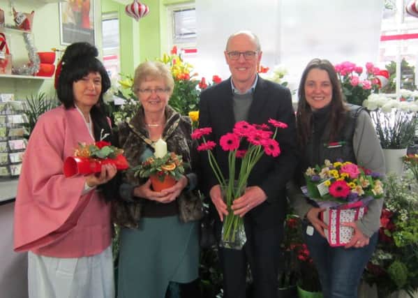 From left, Julie Robey, Littlehampton mayor Marion Ayres, MP Nick Gibb and shop owner Michelle Bly
