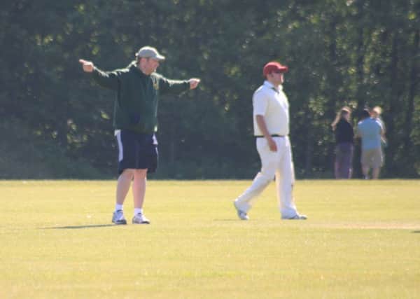 Here I am umpiring during a game. Picture by Rob Legg