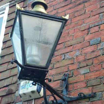 The Victorian-style lamp stolen from behind Nationwide Building Society in Battle