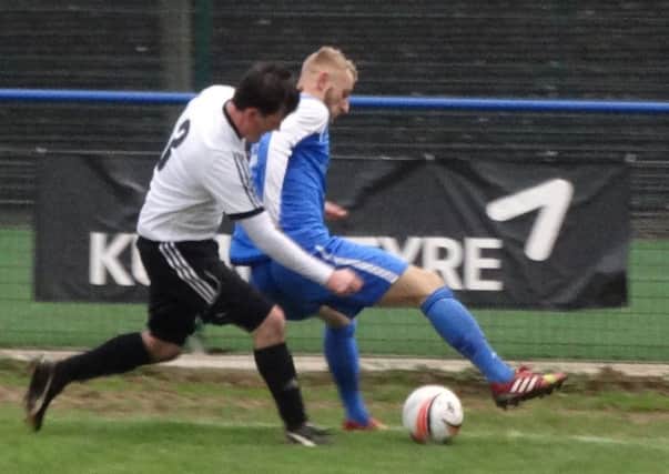 Action from Bexhill United's 4-1 defeat away to Haywards Heath Town last weekend. Picture courtesy Mark Killy