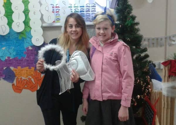 Freya Gibbs donated a nativity outfit to Castledown School's Miss Sellens on day four 499I7Ar8aIcJ1jP1CaV_