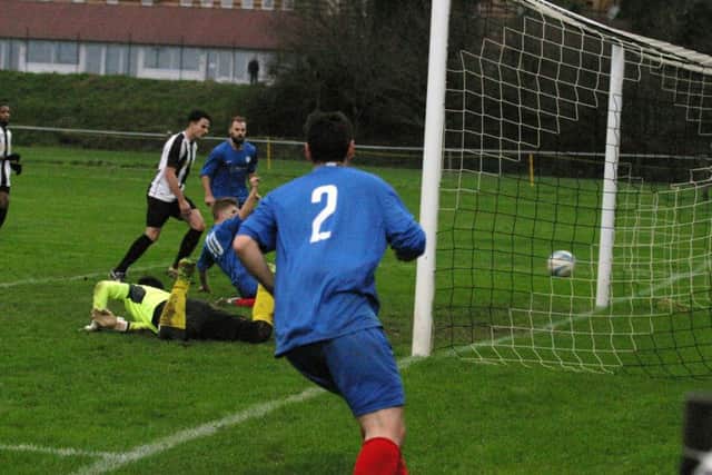 Phil Johnson (No.10) scores for YM. Photo by Clive Turner