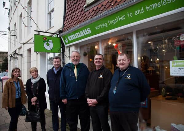 Terry Waite (centre) with Emmaus residents, staff and trustees