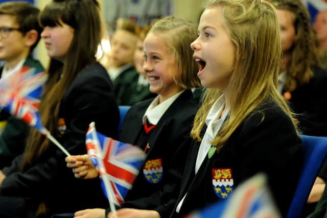 Libby Connor, 13, and her fellow students at Chichester High School for Boys watching the live launch of astronaut Tim Peake going to space Picture by Steve Robards  SR1528337