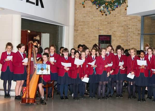Harpist Chloe Ellman Baker accompanies The Towers Convent School  Picture: Warwick Baker