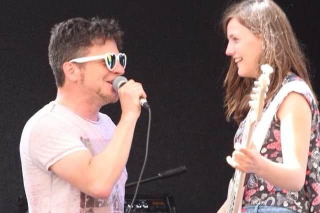 Allstars founder David O'Connell and daughter Ashleigh share a joke on stage 3pyble_0myKfKX3Jn11a