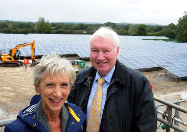 ks1500506-3 Tangmere Solar Farm  phot kate Louise Goldsmith, Leader of West Sussex Country Council and Michael Brown, former cabinet member for Finance, at the new Solar Farm in Tangmere last year.ks1500506-3 SUS-150710-140305008