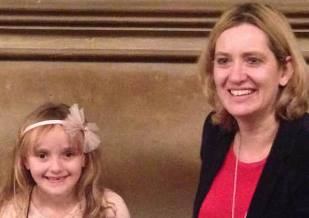 Hastings and Rye MP Amber Rudd in Parliament with winning designer Bonnie