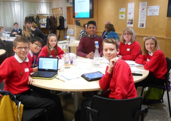 Students taking part in Democracy Day in West Sussex SUS-151217-093058001