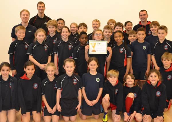 Chesswood Junior School pupils with PE teacher Tim Quick, right, Leon Carter from Active Sussex and Derek Croghan from Striver