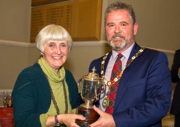 Arundel mayor James Stewart presenting the Community Award to Nell Paton