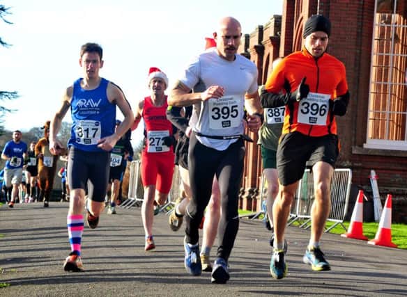 Runners set off in last year's Christmas Pudding Dash at Ashburnham Place